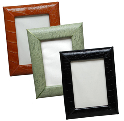 reptile-grain leather 5 x 7 picture frames, shown in luggage, jade and black
