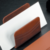 antique tan leather letter rack with stitched detailing