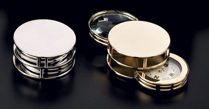 gold and chrome plated compass, magnifier and paperweight combinations