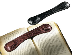 crocodile grain leather book weights, shown in black and brown
