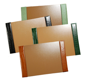 crocodile-grain leather desk pads, shown in jade pebble lizard, black, hunter and luaggage alligator leathers