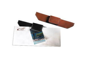 black and tan leather magnetic document clips